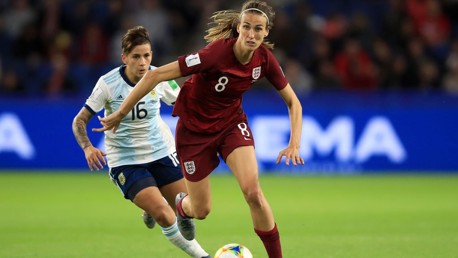 WORKING HARD: Jill Scott surges forward against Argentina.