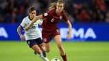 WORKING HARD: Jill Scott surges forward against Argentina.