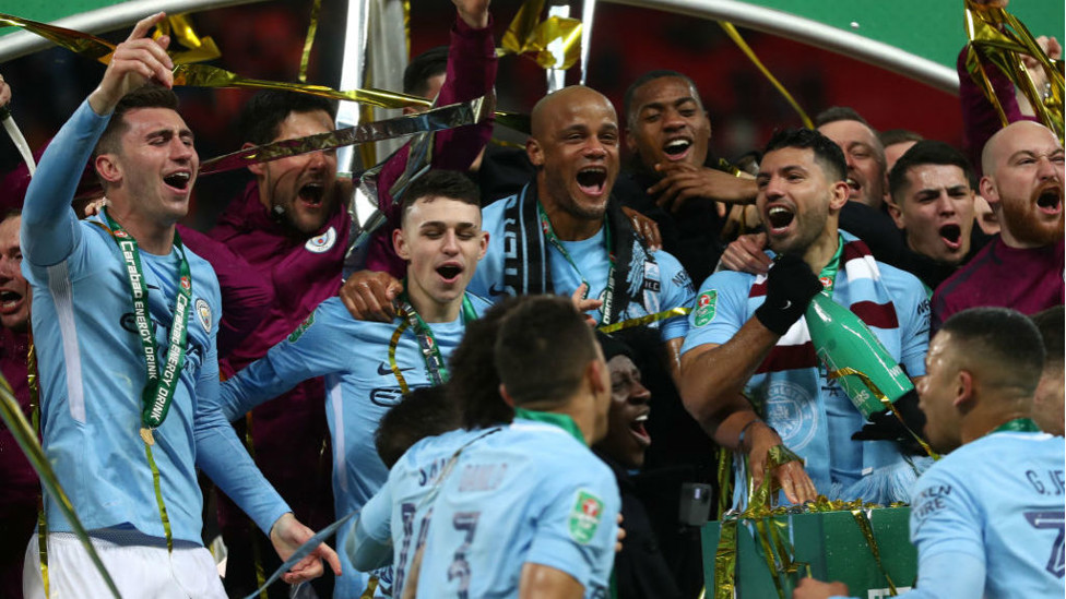 ALL TOGETHER NOW : Laporte and the Blues joyfully celebrate after lifting the 2018 Carabao Cup