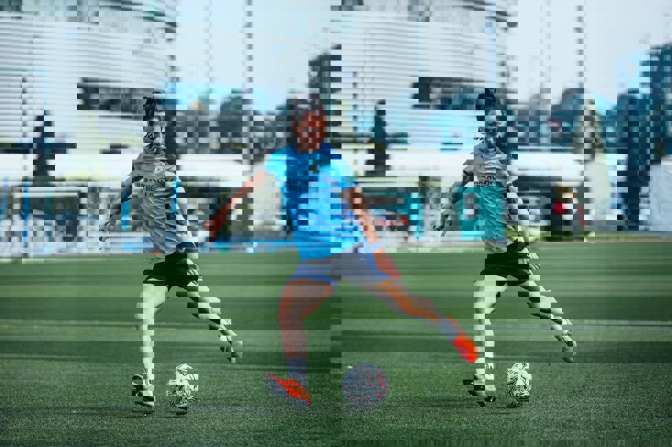 ON TARGET: Megan fires in a cross