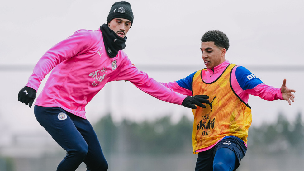 BATTLE  : Reijnders shields the ball from Rico Lewis.