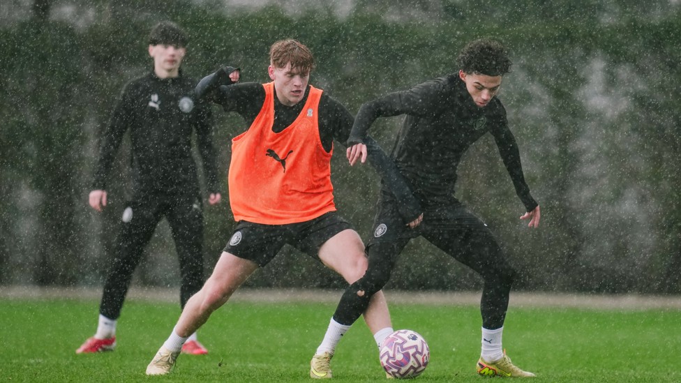 LET BATTLE COMMENCE : Charlie Holt and Kylan Midwood fight for possession. 