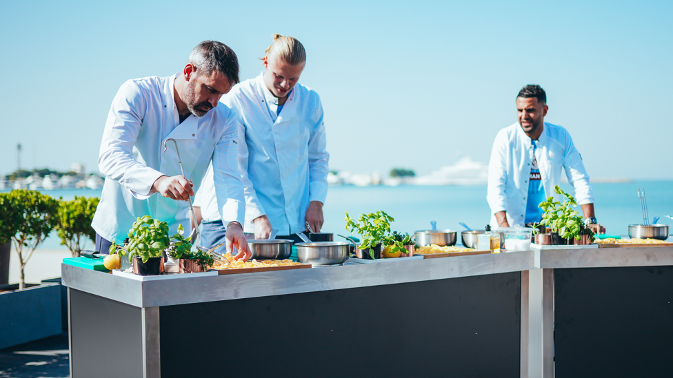 COOKING UP A STORM : Scott Carson joins Haaland and Mahrez in the beachside kitchen