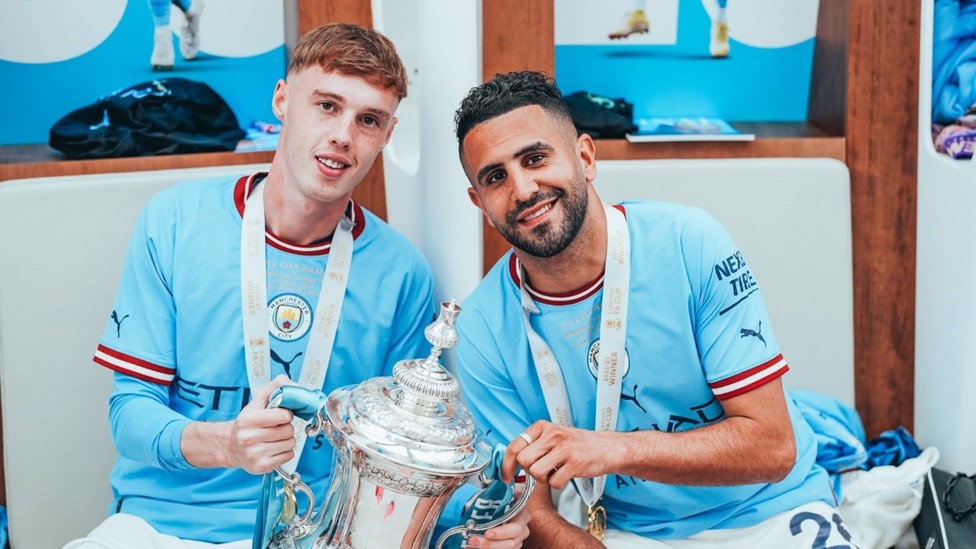 GLORY : Mahrez and Cole Palmer are pictured with the FA Cup trophy in June 2023.