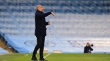 PEP TALK: The boss dishes out instructions from the touchline
