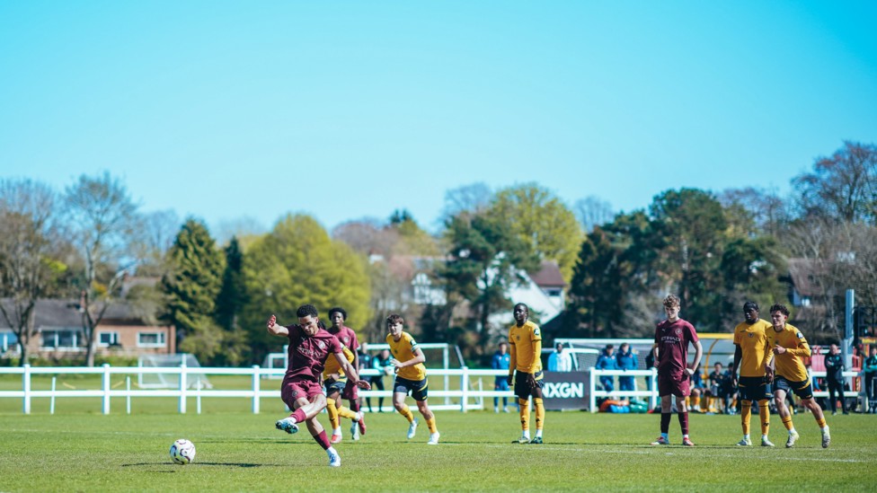 CALM AND COLLECTED : Divine Mukasa fires City ahead from the penalty spot.