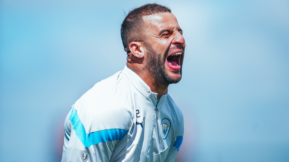 WITTY WALKER : Kyle Walker can't hide his laughter during Thursday's training!