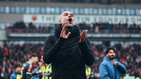 THE BOSS: Applauds the travelling fans.