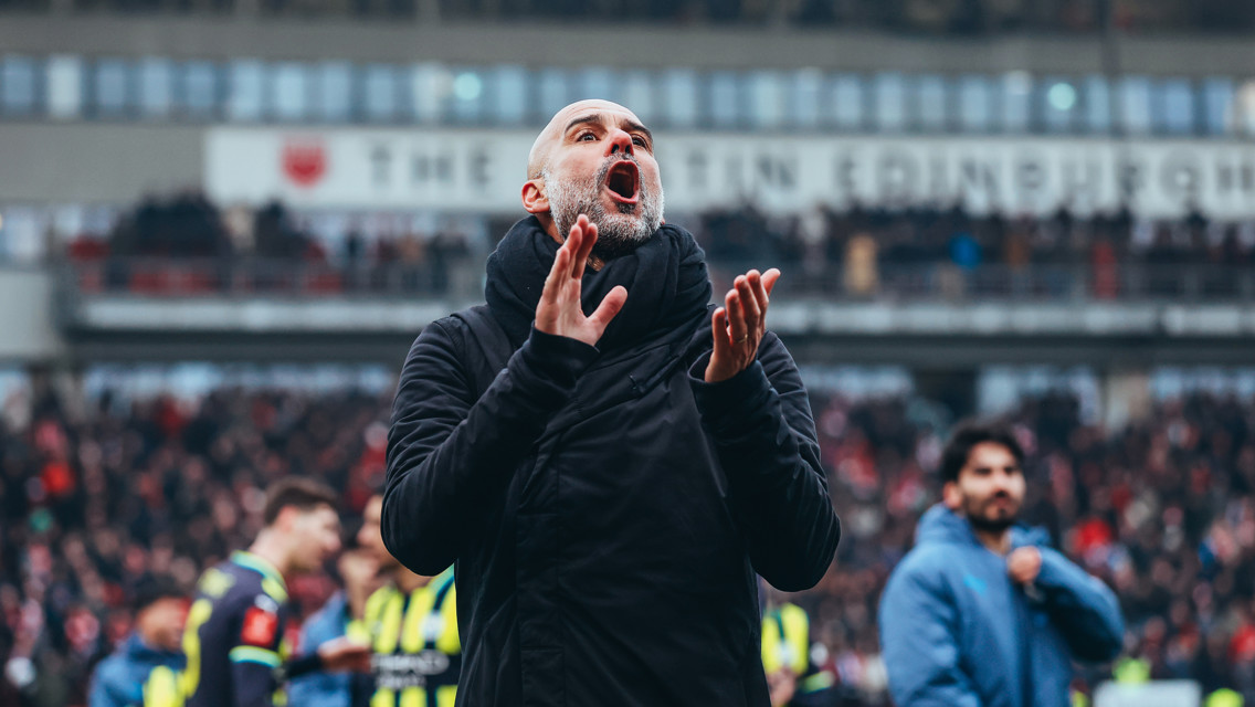 THE BOSS: Applauds the travelling fans.