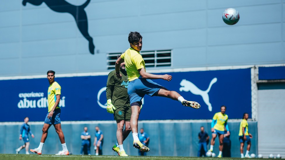 RISING HIGH  : Abdukodir Khusanov flicks the ball on. 