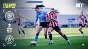 Two female soccer players from Manchester City and Sheffield United competing for the ball during a Women's FA Cup match.