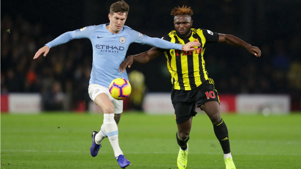 NO ENTRY : John Stones looks to close down Watford's Isaac Success