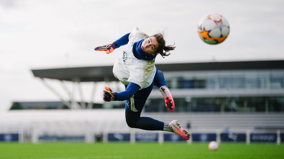 FLYING SCOTSWOMAN : Eartha Cumings leaps to save the ball