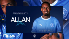 Announcement graphic welcoming Allan to Manchester City. The player is shown in a Manchester City jersey with text 'Bienvenido Al City' and his name 'Allan' with a signature. Brazilian flag is visible.