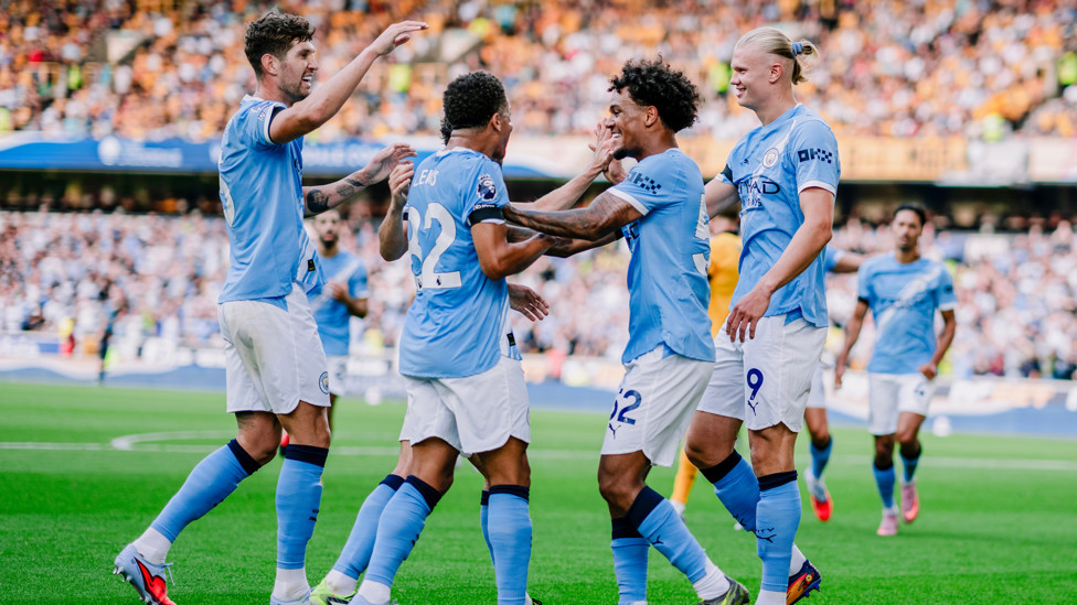 ALL SMILES : The players show their delight.