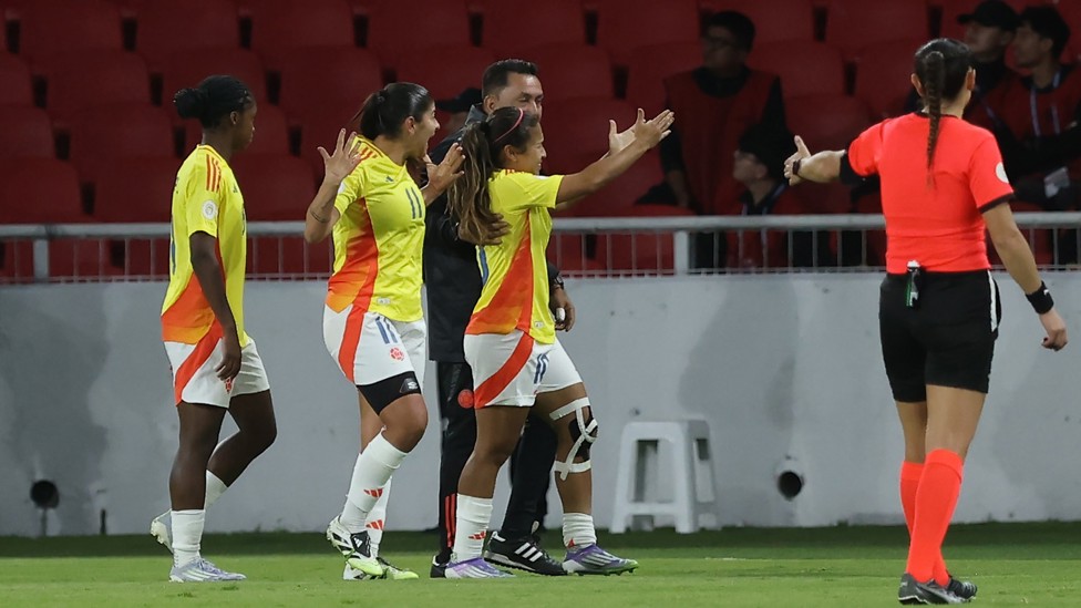 HOW THE TABLES TURN: Leicy Santos celebrates after scoring Colombia's equaliser and the eighth goal of the game