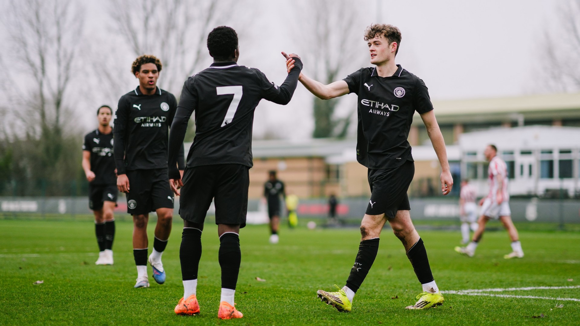 EARLY ADVANTAGE : Matty Warhurst and Ryan McAidoo celebrate our first goal.