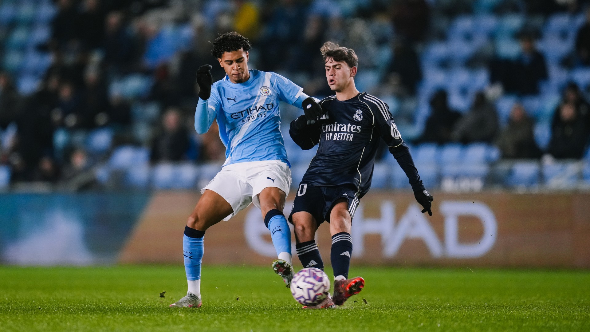 HEAD-TO-HEAD : Emilio Lawrence battles for the ball.
