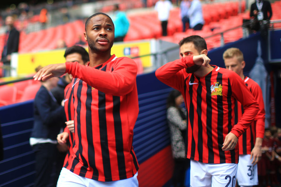 FITTING TRIBUTE: City wore red and black warm up shirts, celebrating the 50th anniversary of our 1969 FA Cup win, ahead of the 2019 final against Watford