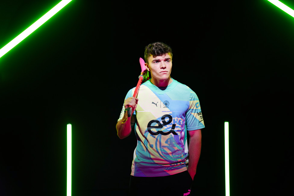 NEW YEAR : Skram turns to his modelling skills to show off the 2022/24 esports kit.