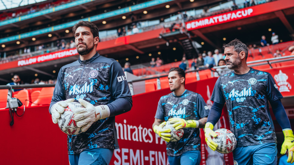 TERRIFIC TRIO : Stefan Ortega Moreno, Ederson and Scott Carson arrive for the pre-match warm up.