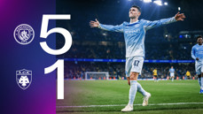 Manchester City defeated AEK Athens 5-1. A Manchester City player wearing the number 47 celebrates with arms wide open. The logos of both teams are shown.