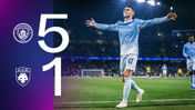 Manchester City defeated AEK Athens 5-1. A Manchester City player wearing the number 47 celebrates with arms wide open. The logos of both teams are shown.