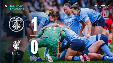 Scoreboard showing Manchester City 1-0 victory over L.F.C. in women's soccer match, with players in Manchester City kits celebrating.