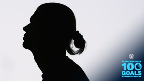 Silhouette of a person with a blurred face and a graphic celebrating Erling Haaland’s 100 goals in the Premier League with Manchester City logo.