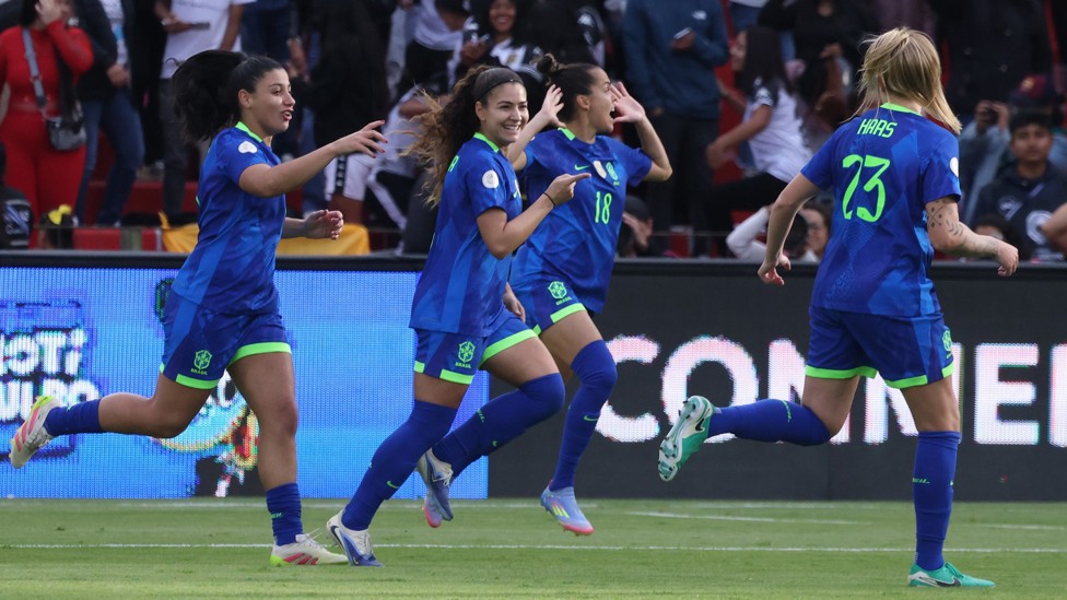 PERFECT PENALTY: Angelina Alonso celebrates with teammates after scoring the team's first goal