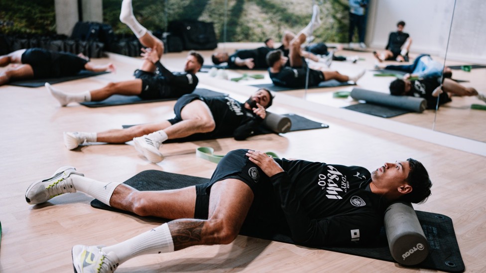 RECOVERY IS KEY : The team take part in some stretches. 