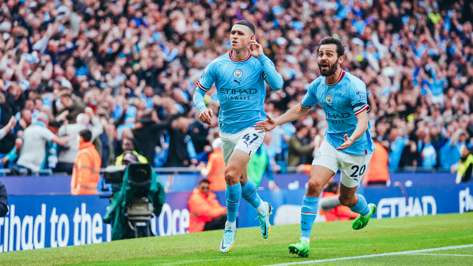 WHAT A START : Foden wheels away to celebrate a stunning early opener!