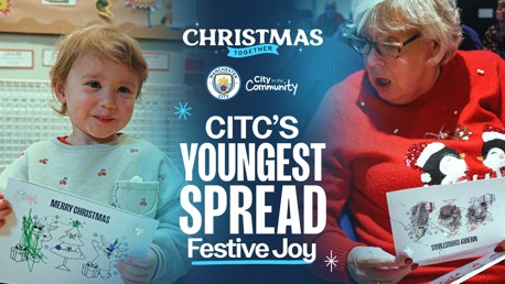 Image promoting CITC's festive initiative by Manchester City, featuring a child and an adult holding holiday cards.
