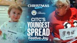 Image promoting CITC's festive initiative by Manchester City, featuring a child and an adult holding holiday cards.