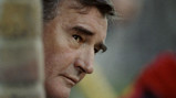 VISION ON: An atmospheric picture of Malcolm looking on from the dugout