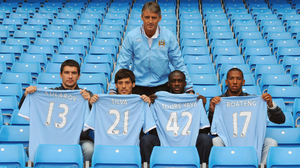 DONE DEAL : David Silva first signed for City back in the Summer of 2010, here is he pictured with fellow signings Aleksandar Kolarov, Yaya Toure and Jerome Boateng and former boss Roberto Mancini.