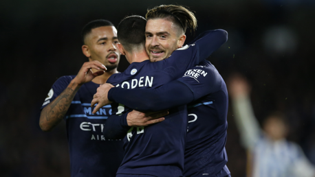 ENGLISH CONNECTION: Grealish and Foden celebrate the second goal!