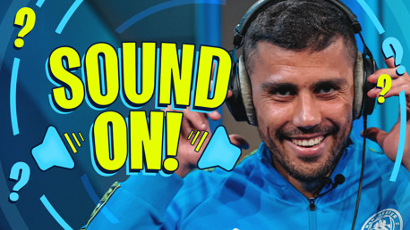 Graphic with the text 'SOUND ON!' surrounded by question marks and icons of sound speakers. A person, whose face is blurred, is adjusting headphones. The setting is bright and colorful, with a blue background.