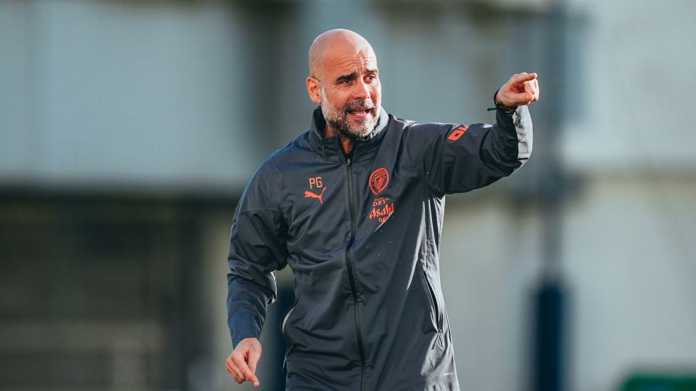 POINTING THE WAY : Pep Guardiola gives clear instructions to his players