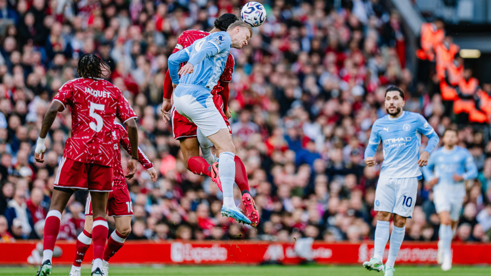 JUMP TO IT: Erling Haaland rises in the Liverpool box.