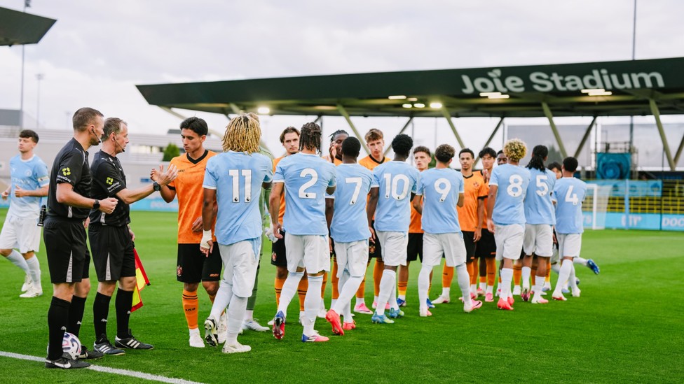 HANDSHAKES : City and Wolves share pleasantries just before kick-off. 