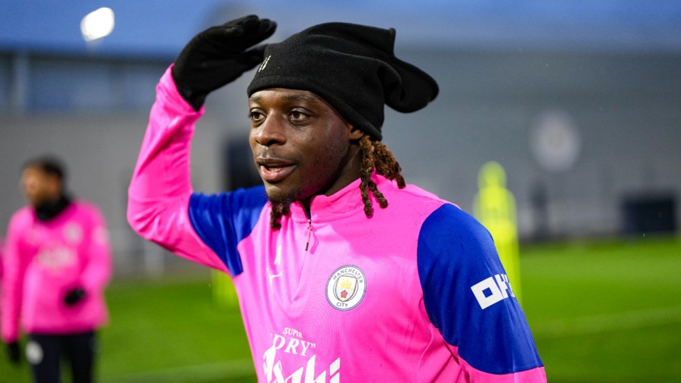 HAT TRICK: Jeremy Doku sports some nifty headwear to keep out the December chill.