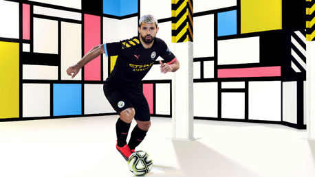ACTION STATIONS: Sergio Aguero is all revved up in City's new 2019-10 PUMA away kit