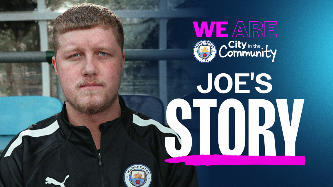 Image depicting a blurred person wearing a black sports jacket with Manchester City emblem. Text reads 'We Are City in the Community' and 'Joe's Story'.