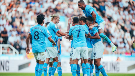 LEVELLER: The players celebrate as Bernardo's cool finish makes it 3-3!