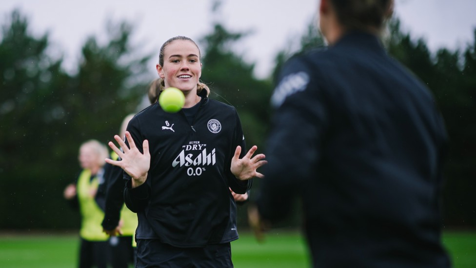EYES ON THE PRIZE : Grace Clinton follows the tennis ball. 