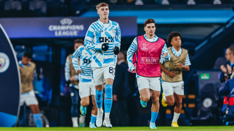 WARM UP : Palmer leads the team out for the pre-match preparations.
