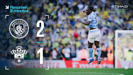 Manchester City defeated Southampton with a score of 2-1. The image highlights a player jumping in celebration at the Etihad Stadium.