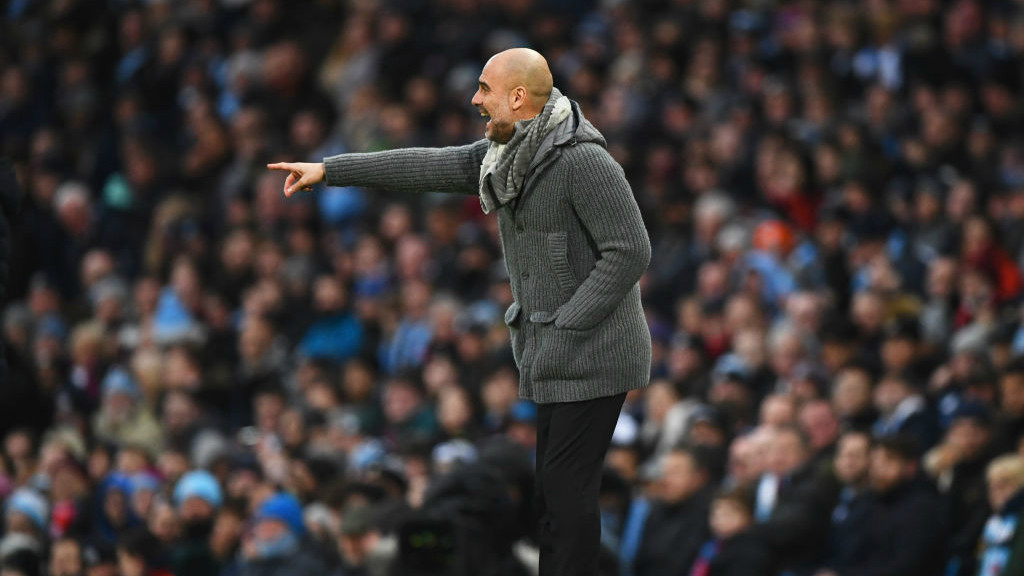 MASTER AT WORK: Pep Guardiola dishes out the orders.