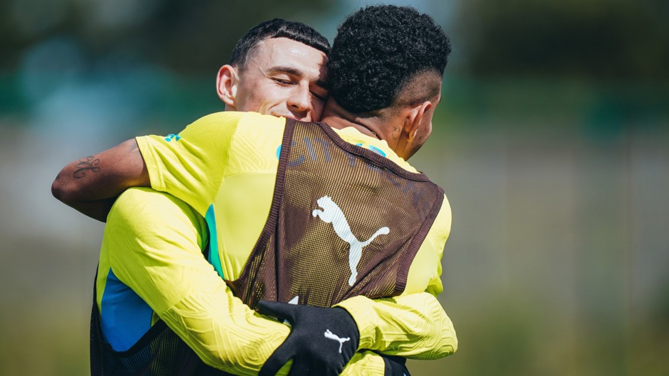 HUG IT OUT : Phil Foden and Savinho are close friends